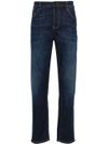 Jeans slim in cotone a vita media