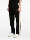 Sports pants with side stripes