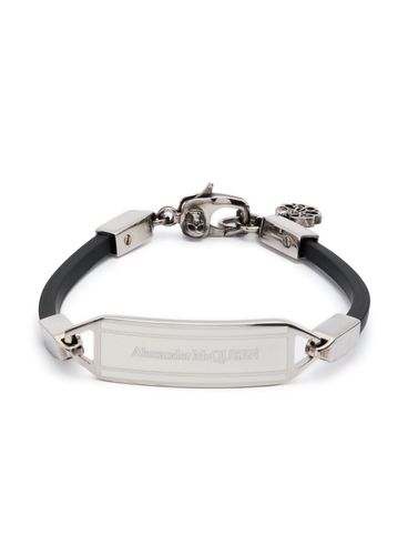 Bracciale con placca logo in ottone e gomma