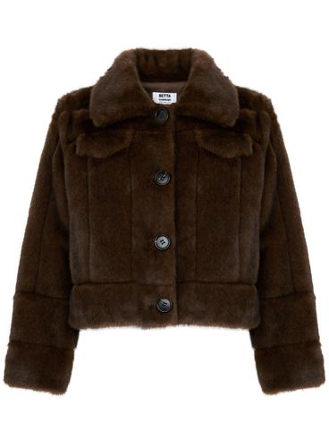 Brown fur coat with pockets