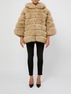 Beige fur coat with hood