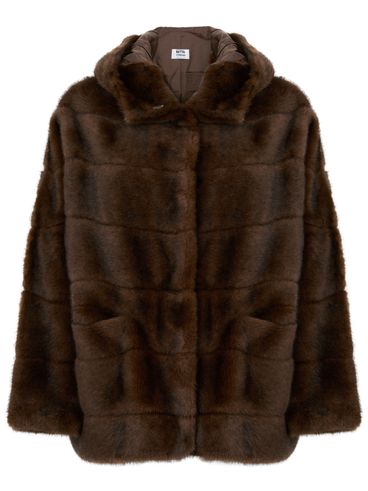 Brown fur coat with pockets