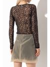 Top semi trasparente con stampa leopardata