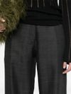 Wool trousers with pressed crease