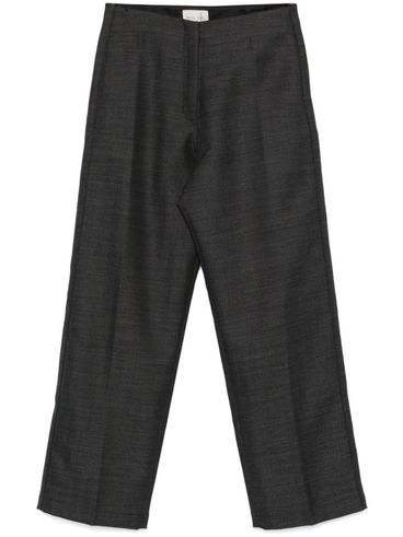 Wool trousers with pressed crease