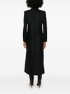 Long wool coat with shoulder pads.