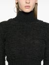 Worn-effect wool sweater