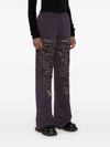 Cotton sweatpants with distressing