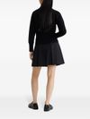 Pleated wool mini skirt