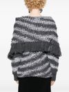 Wool sweater with fringes