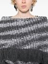 Wool sweater with fringes