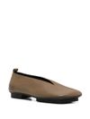 Leather ballet flats with an asymmetric toe