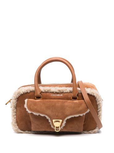 COCCINELLE - Borsa piccola Beat in camoscio e shearling