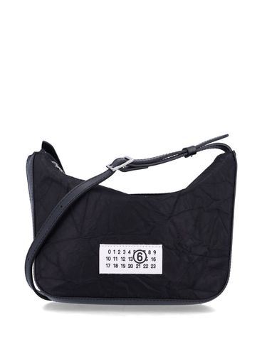 Crinkled-effect shoulder bag with logo