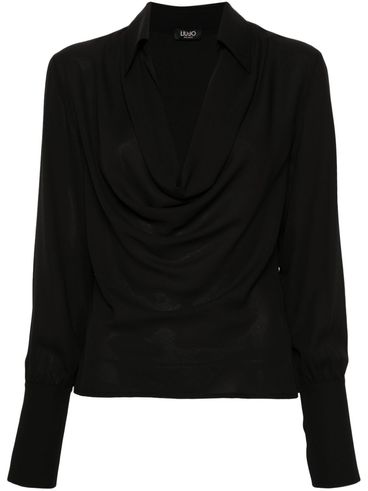 Blusa nera drappeggiata