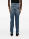 Jeans slim in cotone a vita media