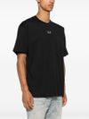 T-shirt in cotone nero con logo