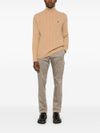 Beige knitted wool turtleneck sweater