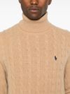 Beige knitted wool turtleneck sweater