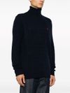 Blue knitted wool turtleneck sweater