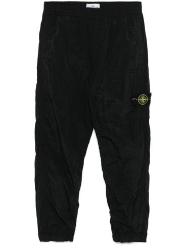 STONE ISLAND - Pants with compass logo