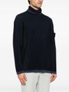 Ribbed turtleneck wool sweater