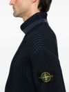 Ribbed turtleneck wool sweater