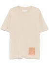 philippe model - T-shirt in cotone beige con patch frontale