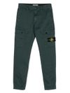 stone island - Pantaloni in cotone verde con tasche e patch logo