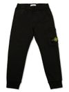 stone island - Pantaloni tuta in cotone nero con tasca e logo