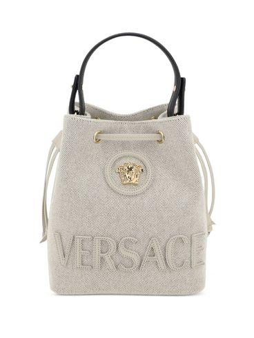 VERSACE - Beige leather bucket bag with drawstring closure