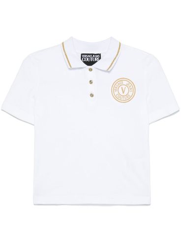 VERSACE JEANS COUTURE - Polo bianca con stampa logo sul petto