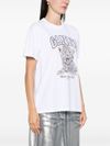 ganni - T-Shirt bianca con stampa grafica e logo - 1