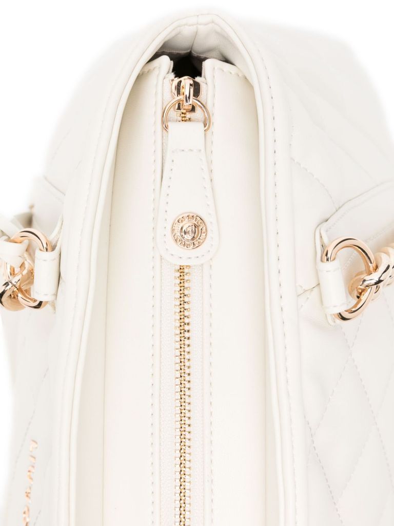 Cream quilted bag with logo