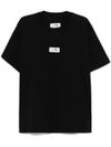 mm6 maison margiela - T-shirt in cotone nero con logo numeri