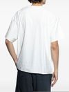 diesel - T-shirt in cotone bianco con stampa logo nero - 3