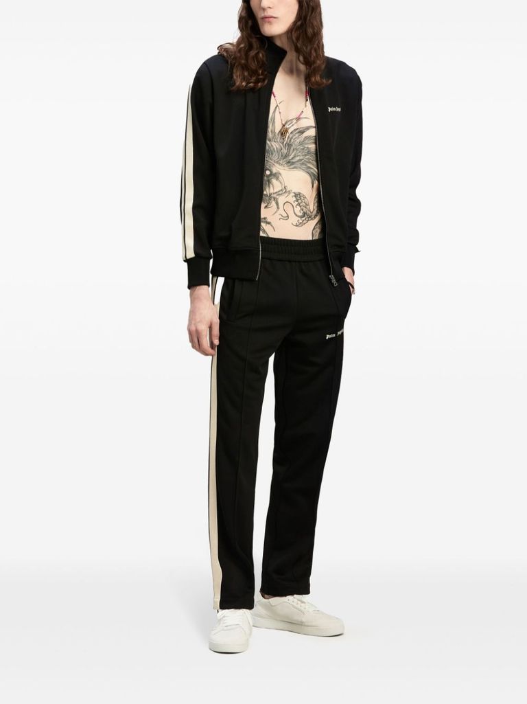 Black pants with white side stripes