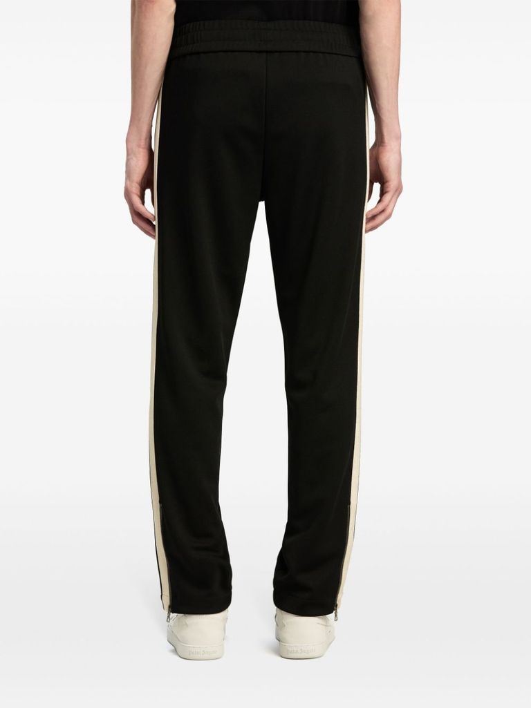 Black pants with white side stripes