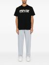 versace jeans couture - T-shirt in cotone nero con logo frontale - 1