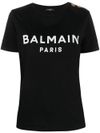 balmain - T-shirt in cotone con logo stampato frontale e bottoni