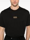 versace jeans couture - Black T-shirt with gold logo tag - 1