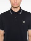 stone island - Polo in cotone blu a maniche corte - 1