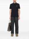 stone island - Polo in cotone blu a maniche corte - 4