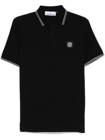 STONE ISLAND - Polo in cotone nero a maniche corte con righe