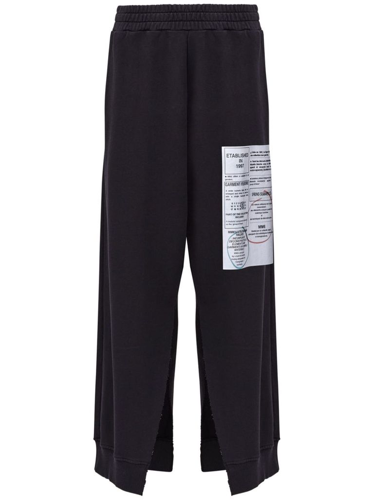 Shop Mm6 Maison Margiela Black Track Pants With Cut-out Details