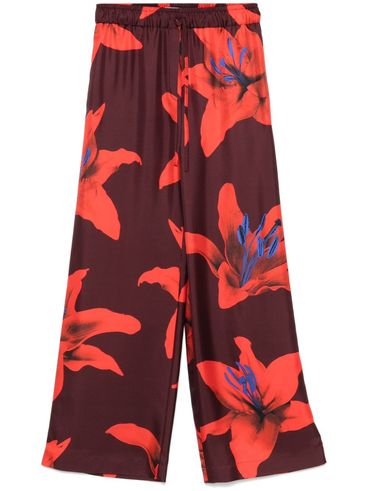 ALEXANDER McQUEEN - Soft silk trousers with print