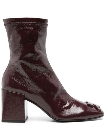 COURRÈGES - Burgundy '70mm' boots with logo